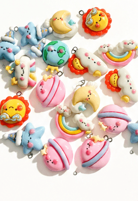 Rainbow, star, and cloud character charm accessories for custom keyrings